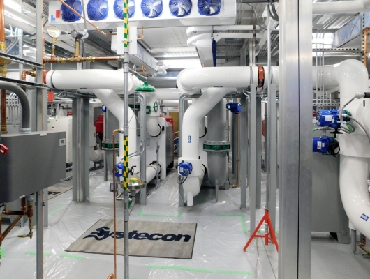 piping system with white pipes and fans - Systecon