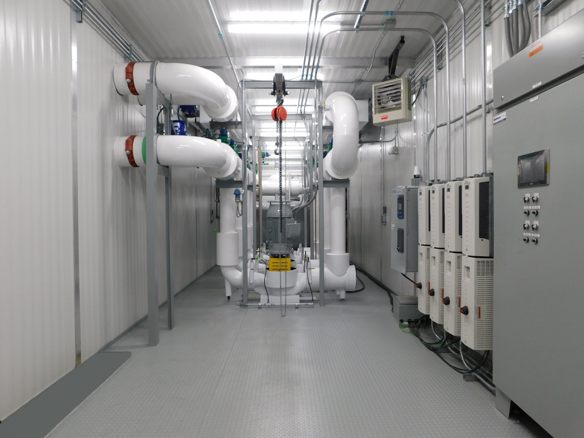 Photo of an enclosed Systecon custom pumping system